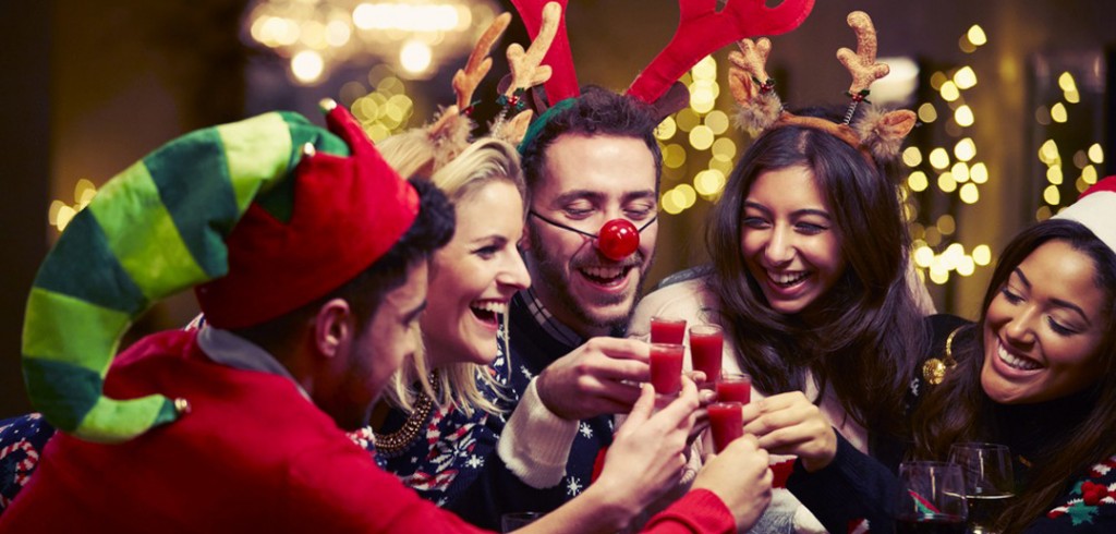 How to Survive Your Office Christmas Party Colleagues enjoying their office Christmas party